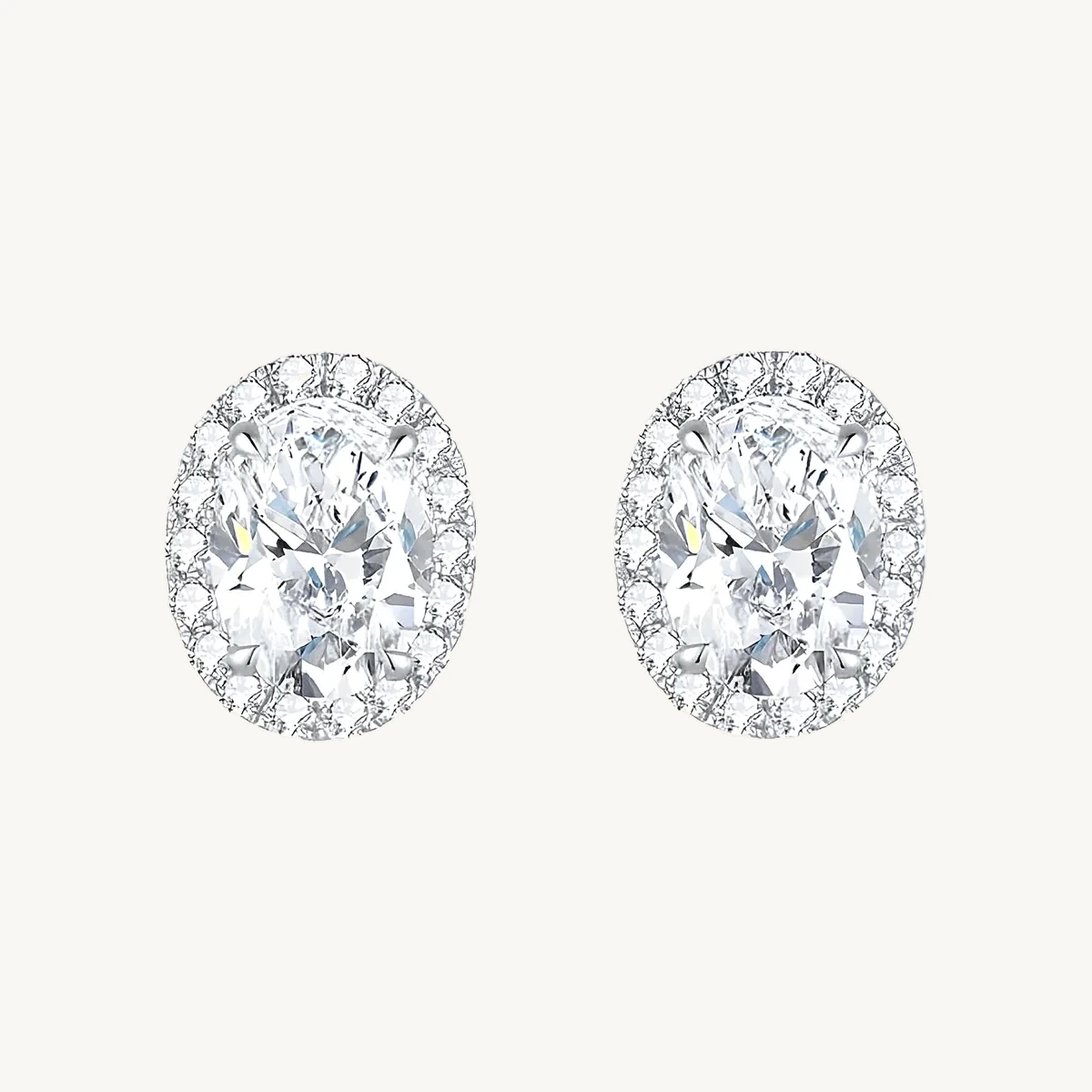 Oval Halo Stud Earrings in 14k White Gold