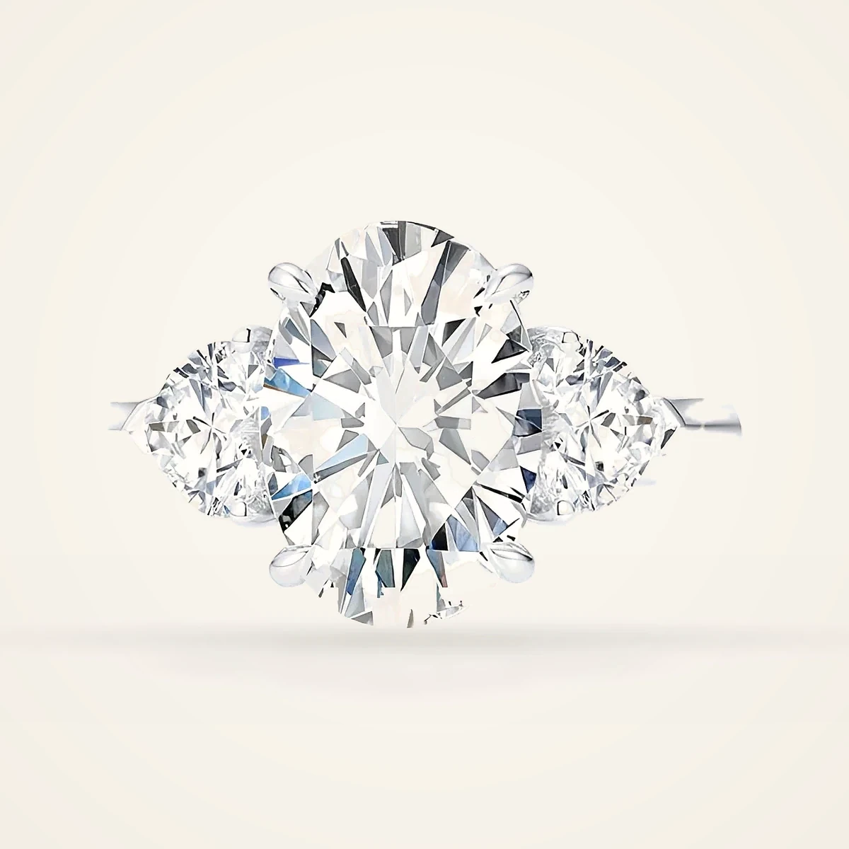Oval Three Stone Ring with Pear Sides in 14k White Gold